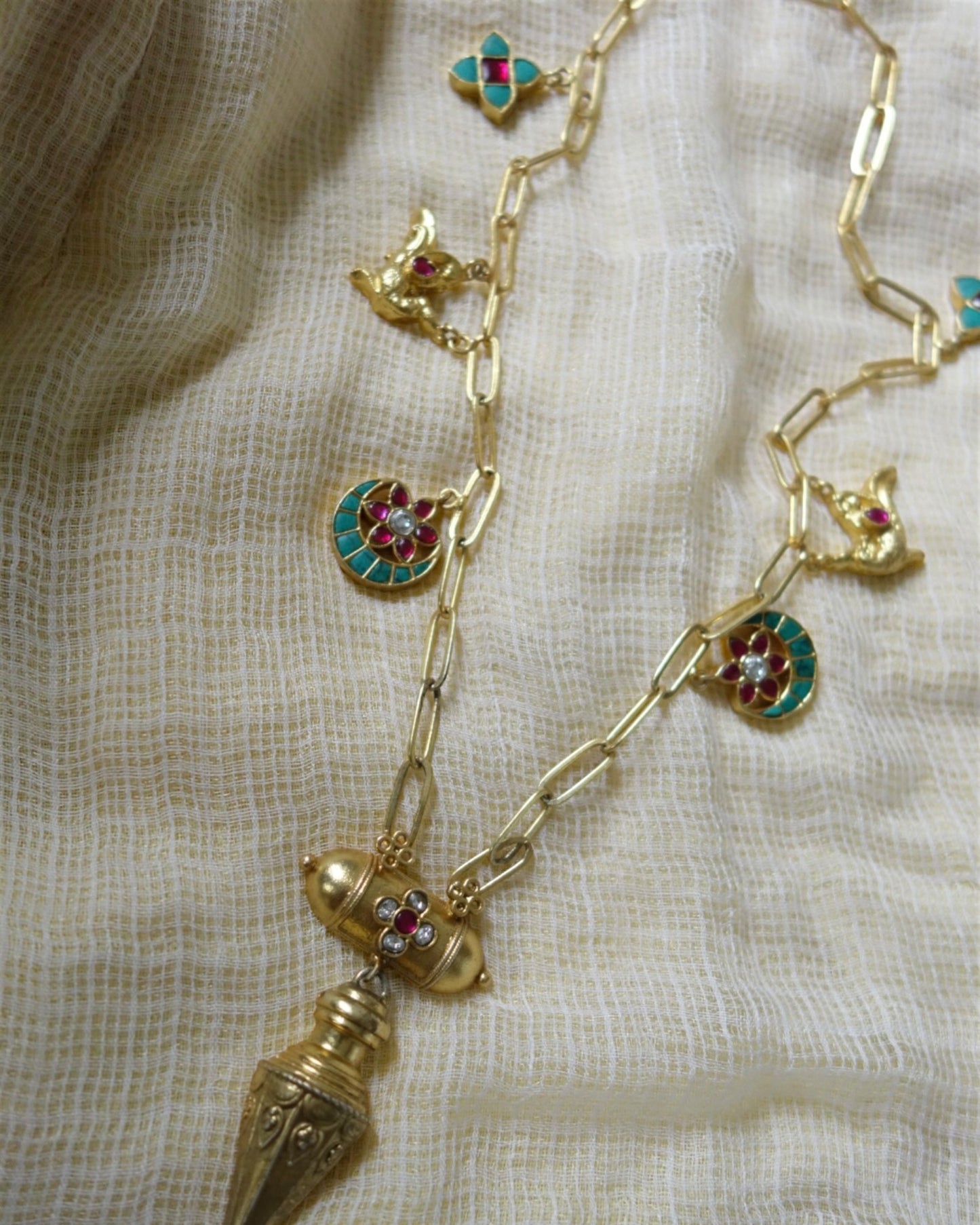 Multicoloured floral and crescent necklace set