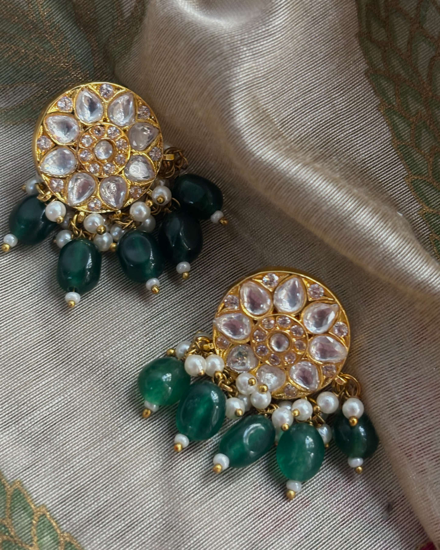 Suman kundan studs with green drops