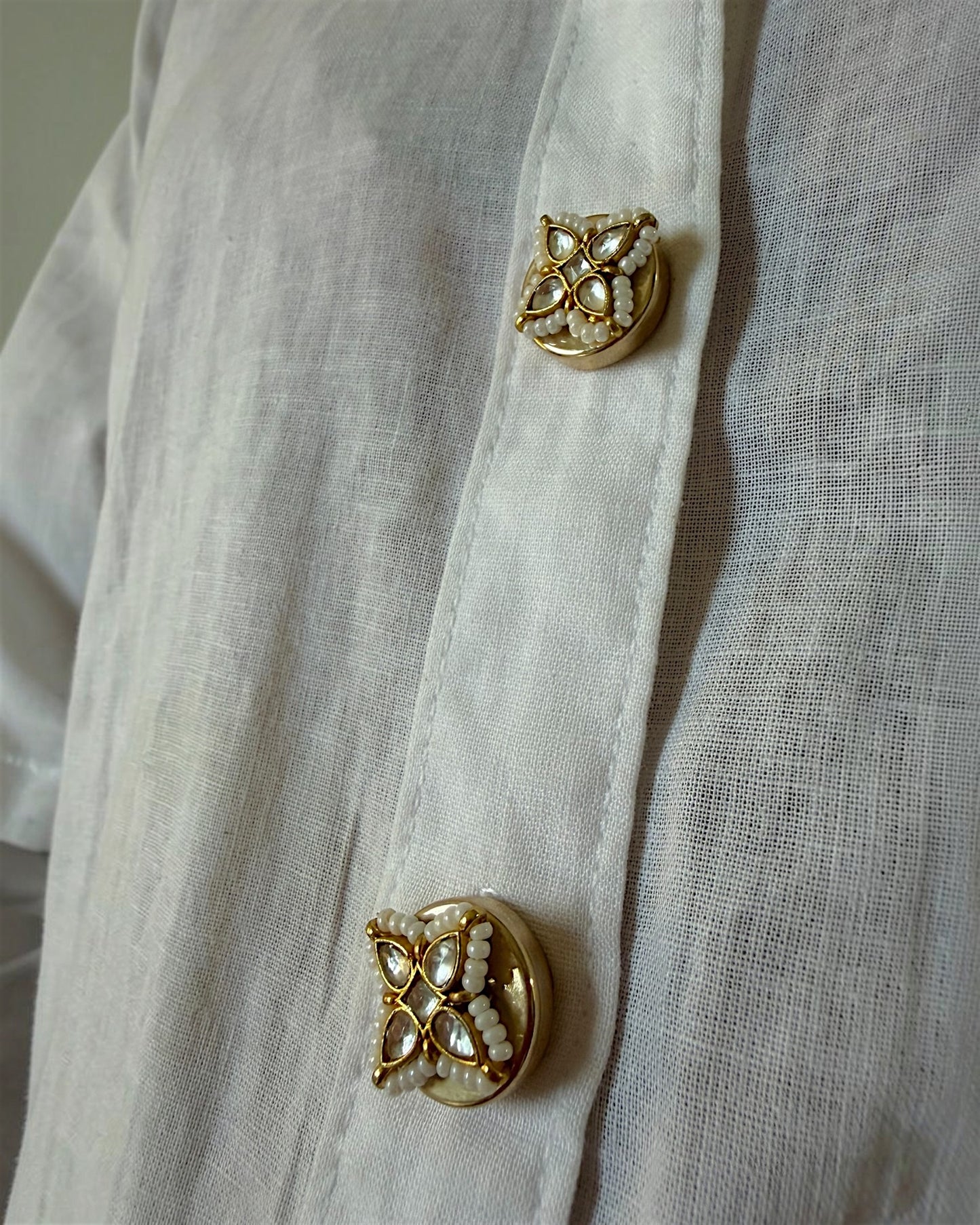 Four-petal floral button clips
