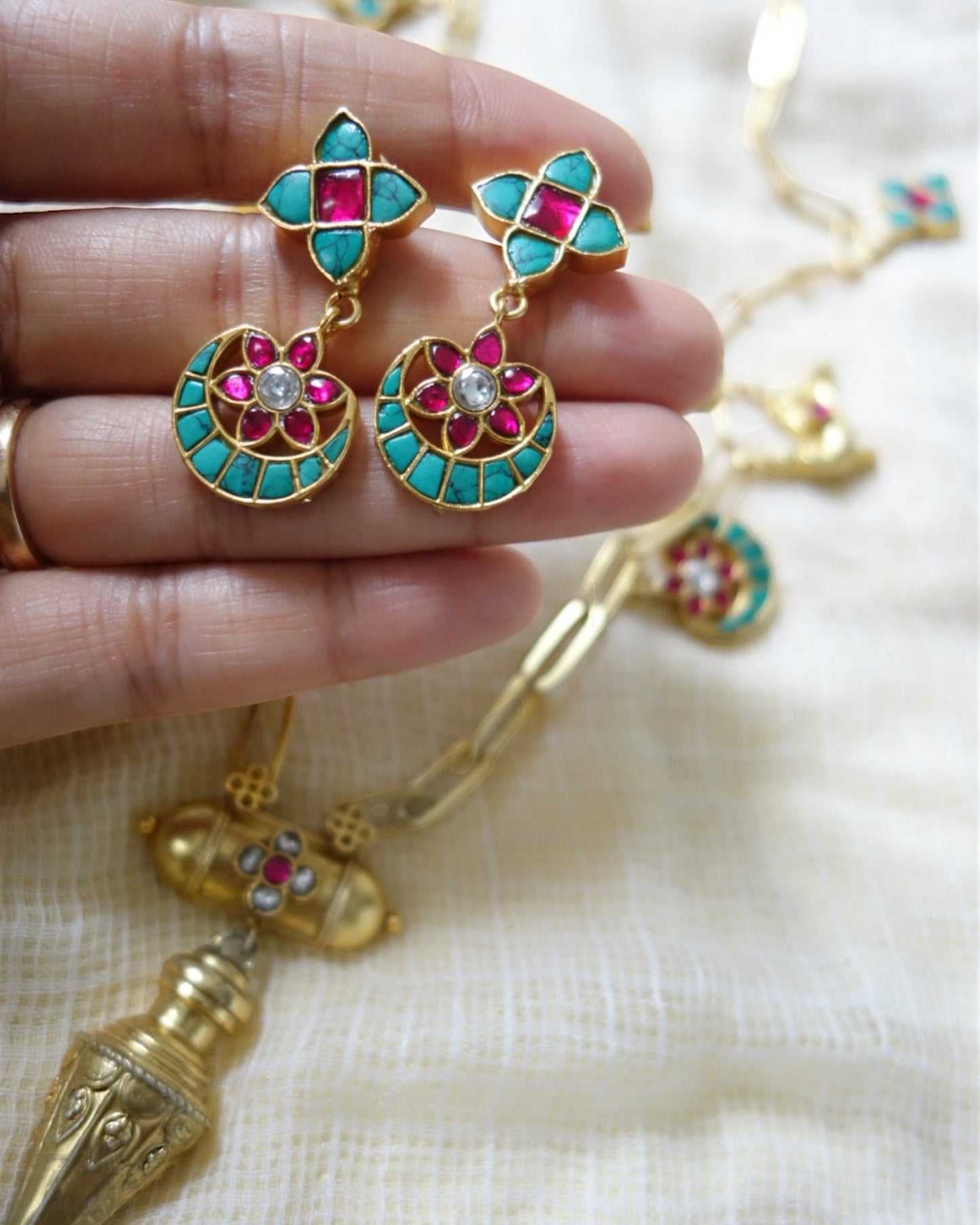 Multicoloured floral and crescent necklace set