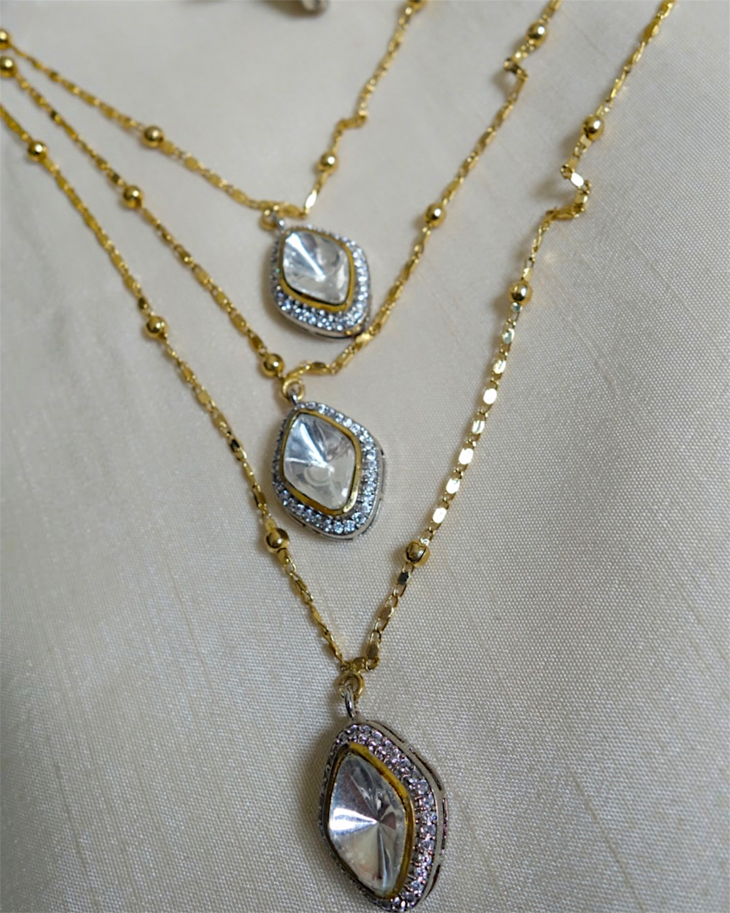 Aaira dual-tone layered necklace set